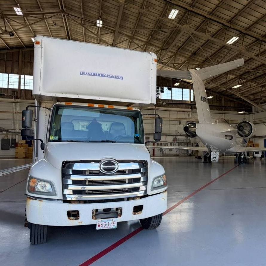 VIP Movers truck and airplane